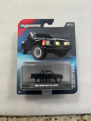Nuevo Majorette 1:64 Collector Series - Toyota Hilux SR5 1985 Pickup - Negro Foto 1 de 3