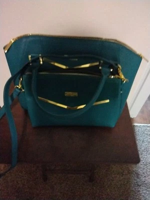 JOY & IMAN Cartera y Bolso de Mano de Cuero de Alta Costura con Detalle de Terciopelo Conjunto JADE Foto 1 de 3