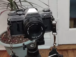 Canon AT-1 35mm SLR Film Camera with Canon 50mm f/1.8 FD Lens/ Tripod. Untested - Picture 1 of 10