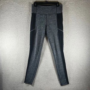 Leggings elevados Athleta espiga negros bolsillos laterales con cremallera ropa deportiva medianos - Imagen 1 de 11