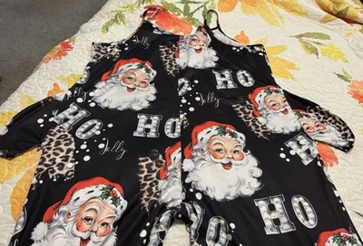 Mono de vacaciones Santa Hoho 2X negro y multicolor elástico y cómodo usado en excelente estado Foto 1 de 3