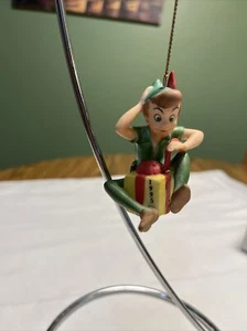 VTG Grolier Disney Peter Pan Xmas Ornament 1995 He’s Opening A Present Porcelain - Picture 1 of 9