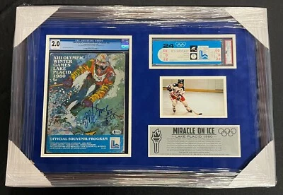 1980 OLYMPICS MIRACLE ON ICE MIKE ERUZIONE SIGNED FRAMED PROGRAM & TICKET PIECE - Image 1 of 4