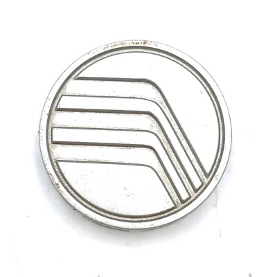 Tapa central de rueda Mercury Tracer 1997-99 plateada F0K6-1A096-AA - Original OEM Foto 1 de 4