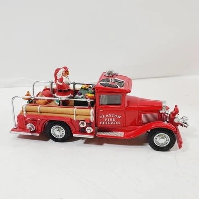 MATCHBOX YSC04-M FORD AA SANTA'S 1997 CAMIÓN DE BOMBEROS NAVIDAD MODELO FUNDIDO A PRESIÓN EN CAJA Foto 1 de 4