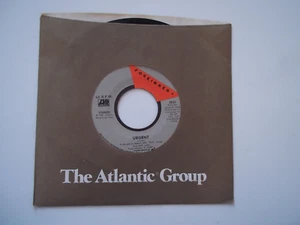 FOREIGNER - Urgent (3:57)  / Girl On The Moon 45 RPM 7" Record Single 1981 - Picture 1 of 6