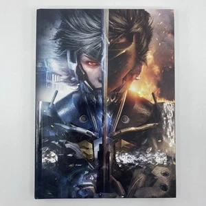 Metal Gear Rising Revengeance Collector's Edition Guide-Hardcover W/ Lithograph - Foto 1 di 6