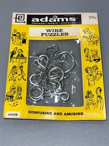 Collectible RARE 1958 Adams Pranks Wire Puzzles Magic Tricks Sealed Package - Picture 1 of 7