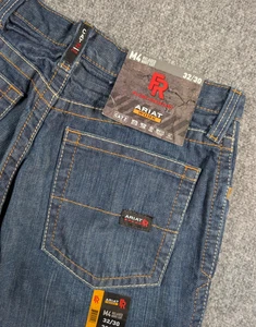 Ariat FR M4 Relaxed Boot Jeans Herren 32/30 Medium Wash Denim Western Arbeit Neu mit Etikett - Bild 1 von 11