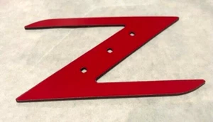 NUEVO AJUSTE NISSAN 350 Z 350Z SE ADAPTA 2003 2004 2005 LOGO Z EMBLEMA PLÁSTICO ROJO 1 PIEZA - Imagen 1 de 12