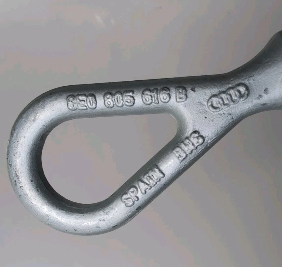 2005 - 2011 奥迪 A6 Quattro 紧急拖钩牵引铰链眼原始设备制造商 8E0805616B — 第 1/4 张图片