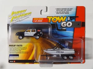 JOHNNY LIGHTNING - MIAMI BEACH POLICE - 1988 JEEP CHEROKEE / MASTERCRAFT BOAT - Picture 1 of 1