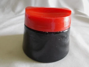 VINTAGE VANITY BLACK GLASS COSMETIC CREAM JAR RED LID - EMPTY - Picture 1 of 5
