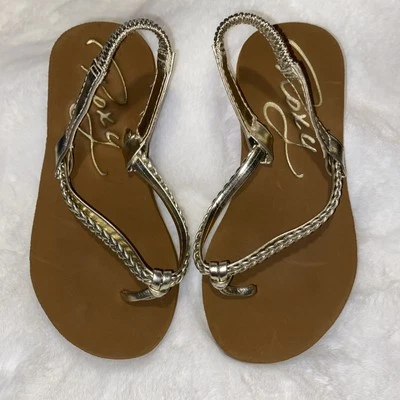 Sandalias chanclas Roxy doradas metálicas para niñas talla 11 correa trasera niño pequeño usado en excelente estado  Foto 1 de 4