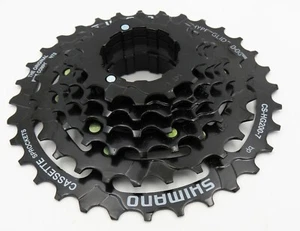 Shimano Cassette CS-HG200 7 Speed 12-28/32 Tooth Hyperglide Black -H - Picture 1 of 10