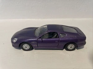 Maisto Aston Martin DB7 Purple 1/40 Scale Pull-Back Toy Car *WORKS* - Picture 1 of 5