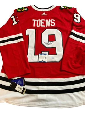 CAMISETA ADIDAS FIRMADA POR JONATHAN TOEWS CHICAGO BLACKHAWKS BECKETT BAS CERTIFICADO DE AUTENTICIDAD BE50458 Foto 1 de 4