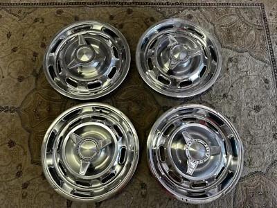 64 1964 Pontiac GTO Lemans Tempest tapacubos giratorios originales Foto 1 de 4