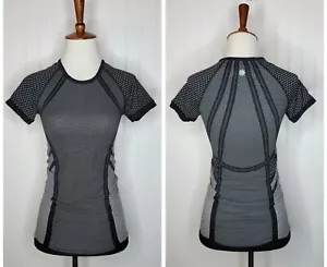 Athleta Fastest Track Seamless Short Sleeve Shirt Women's Size XS Black Dot - Picture 1 of 10