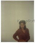 COLOR PHOTO P_1640 PRETTY WOMAN WITH HANDS ON HIPS