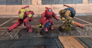 3 Tau Stealthsuits PAINTED in Farsight colours - Picture 1 of 2