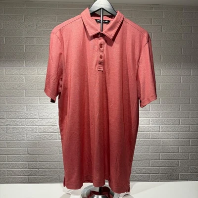 Camisa polo de golf Travis Mathew XL jaspeada coral manga corta abotonada para hombre Foto 1 de 3