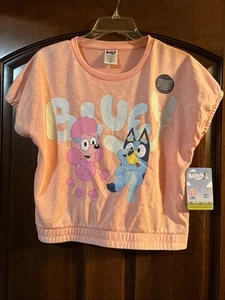 Bluey Mädchen Größe XL (14-16) Pfirsich Baumwollmischung Top mit Bluey & Coco Neu mit Etikett - Bild 1 von 11