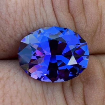 Corte de nivel de competencia de tanzanita natural AAAA+ 11,09 quilates certificado GIA Foto 1 de 2