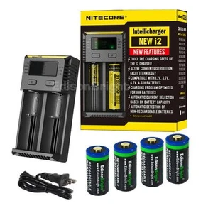 NITECORE Nuovo caricatore i2 con 4 batterie ricaricabili RCR123A Li-ion 650mAh EBR65 - Foto 1 di 12