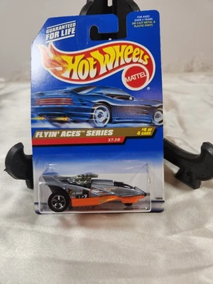 Hot Wheels Flyin' Aces Series XT-3 #740 plateado y naranja con 5 velocidades 4 de 4 1:64 Foto 1 de 4