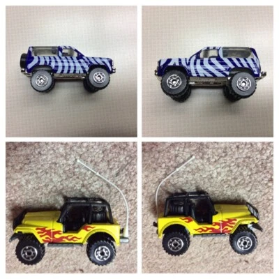 1 MATCHBOX FORD BRONCO II ZEBRA VARIATION & 1 MATCHBOX JEEP 4X4 YELLOW FLAME. - Image 1 of 3