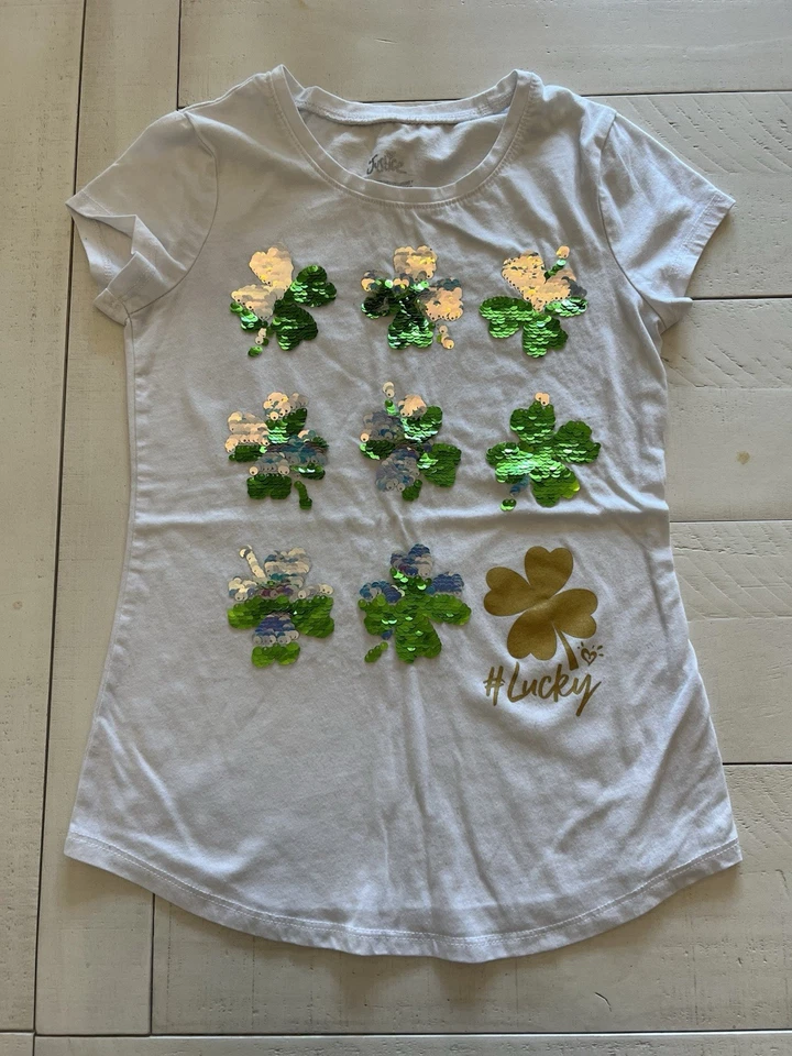 Pantalones irlandeses unicornio negros de 2 piezas Justice Girls con camiseta trébol blanco talla 10 Foto 1 de 4