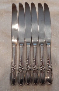 ONEIDA COMMUNITY PLACCATO ARGENTO MODELLO "ORCHIDEA BIANCA" 6 COLTELLI DA TAVOLA 9 3/8" - Foto 1 di 3
