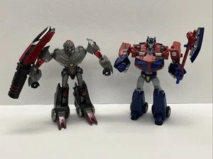Transformers Animated The Battle Begins Deluxe Class Optimus Prime And Megatron - Picture 1 of 18