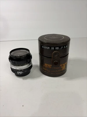 Lente gran angular Nikon Nikkor-N Auto 24 mm f/2,8 no Ai MF con estuche Foto 1 de 4