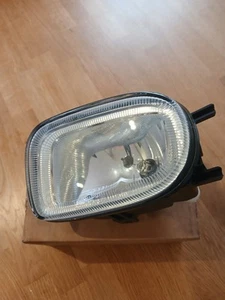 Nissan Micra K11, Nebelscheinwerfer vorne LH, neu im Paket Originalteil. Baujahre 00-03. - Bild 1 von 3