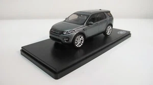 1:43 IXO LAND ROVER DISCOVERY SPORT GRIGIO LHD PRESSOFUSO AUTO SCATOLA CONCESSIONARIA - Foto 1 di 9
