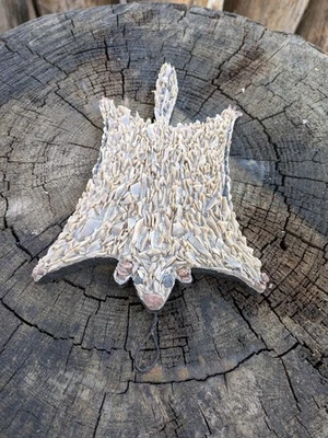 Mosaico de guijarros ardilla voladora con gancho colgante piedra natural Foto 1 de 4