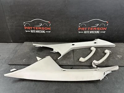 04-11 PAR DE PANELES DE MOLDURA MANIJA DE AGARRE PILAR A IZQUIERDO Y DERECHO NISSAN TITAN KING CAB Foto 1 de 4