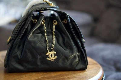 Chanel 25 Black Quilted Oiled Leather Hobo Shoulder Bag – Gold Hardware - Image 1 of 4