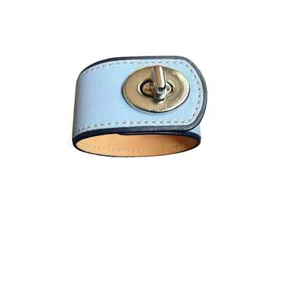 Coach - Brazalete grande de cuero con cierre giratorio ancho - Pulsera única azul/plateada Foto 1 de 4