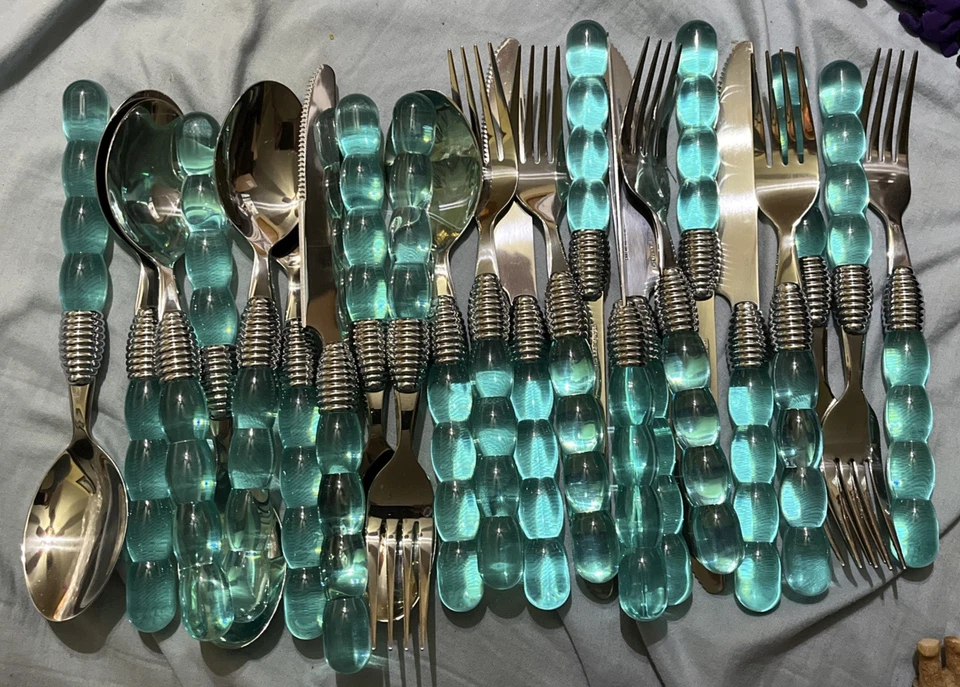 23 Piece Cutlery Set Stainless Steel Blue Plastic 8 Spoons, 8 Forks, 7 knifes - Image 1 of 4