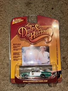 Johnny Lightning 1:64 Sheriff Little's Dodge Monaco Patrol Car Duke's of Hazzard - Picture 1 of 3