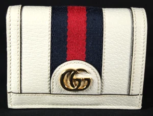 Cartera compacta GUCCI de cuero blanco y tela a rayas dorada GG pequeña OPHIDIA - Imagen 1 de 10