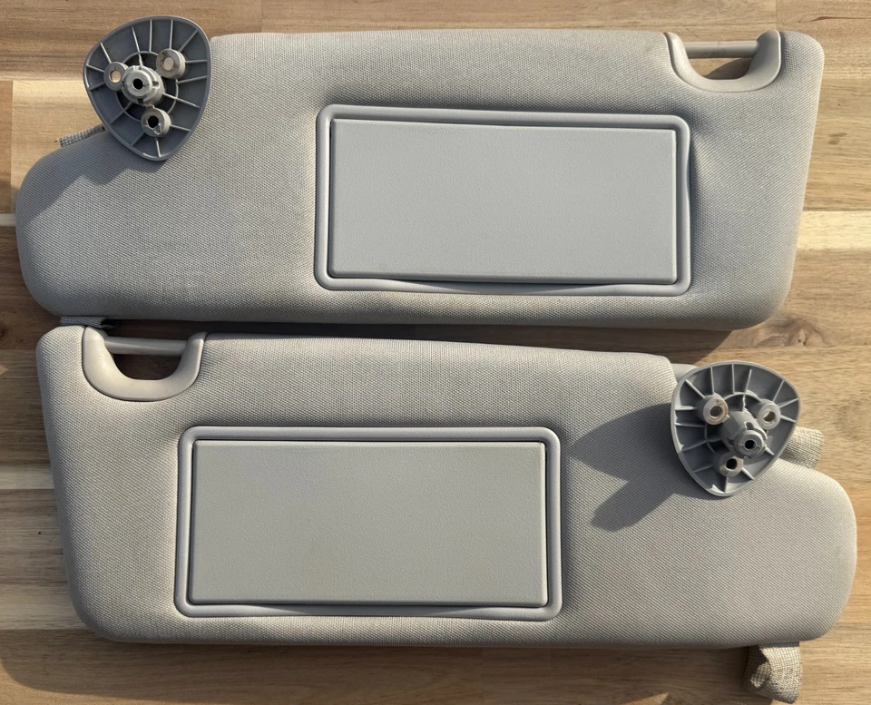 Parasoles grises laterales para conductor y pasajero Chevrolet HHR 2006-2011 OEM Foto 1 de 3