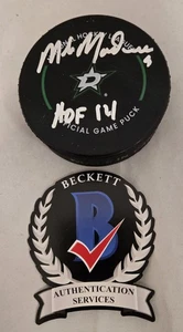 Mike Modano HOF 14 Signed Dallas Stars Official Game Hockey Puck Beckett Auto - Picture 1 of 4