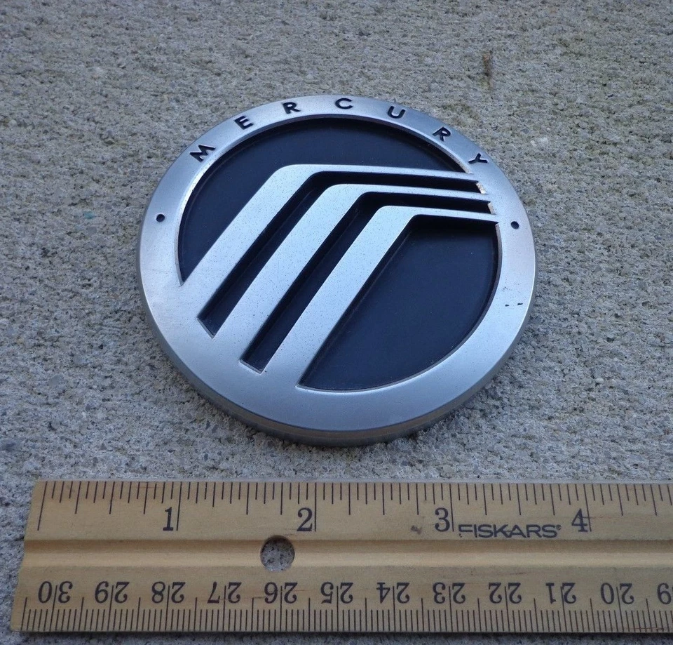 Mercury Mariner emblema maletero insignia calcomanía logotipo portón trasero plateado OEM genuino Foto 1 de 1
