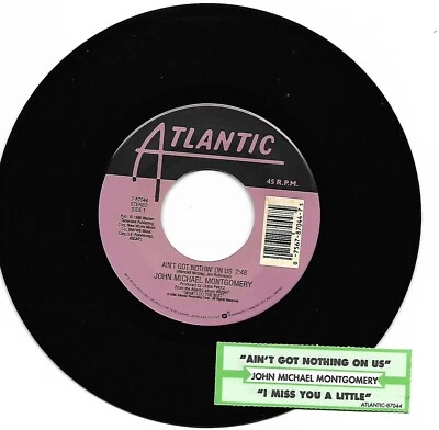 John Michael Montgomery, Ain't Got Nothing On Us/I Miss You A Little 45 VG++  Foto 1 de 2