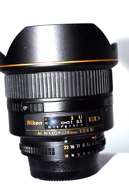 Lente asférica gran angular Nikon 14 mm 1:2,8D ED RF AF Nikkor para cámara. COMO NUEVO. Foto 1 de 4