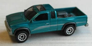 Matchbox 1995 Nissan Hardbody D21 Pickup Camion Benzina Metallizzato MBX Mattel Auto '95 - Foto 1 di 4